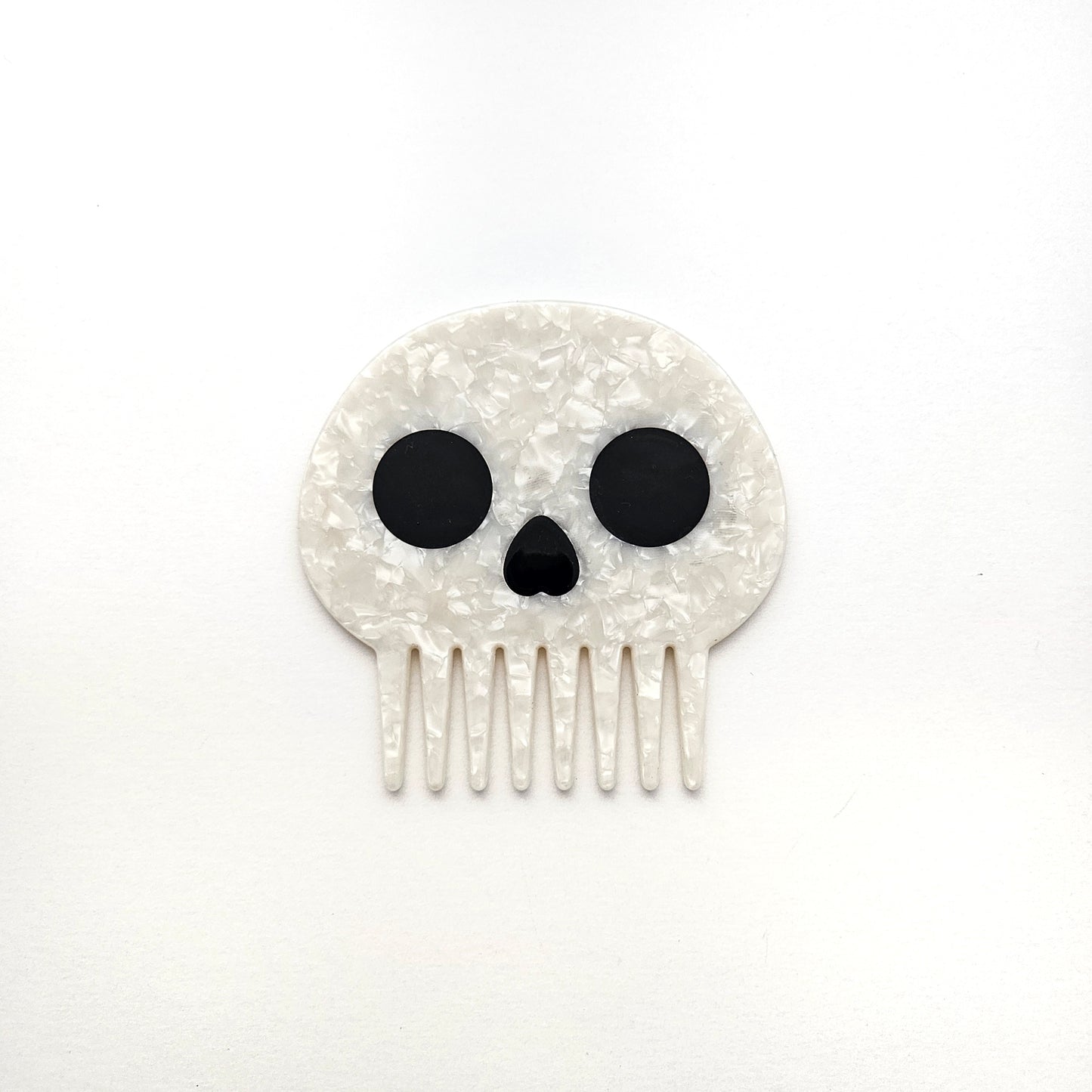 Skull wide tooth comb