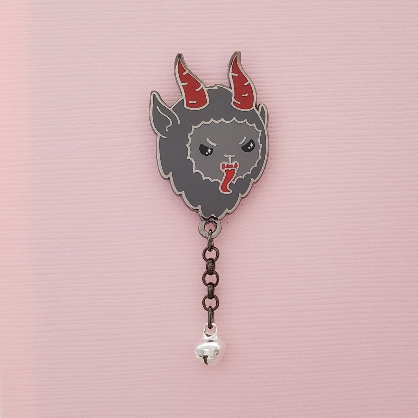 Krampus pin with jingle bell