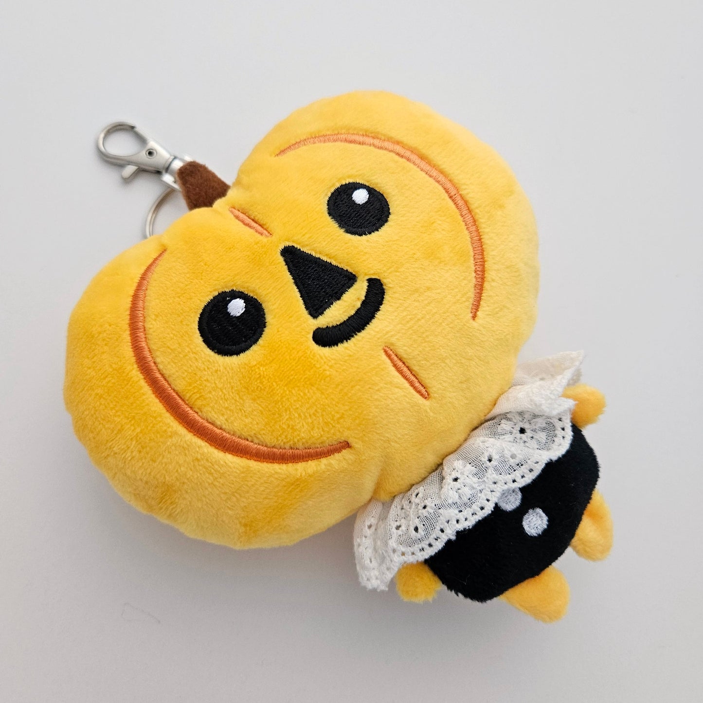 pumpkin boi plush keychain with zipper pouch